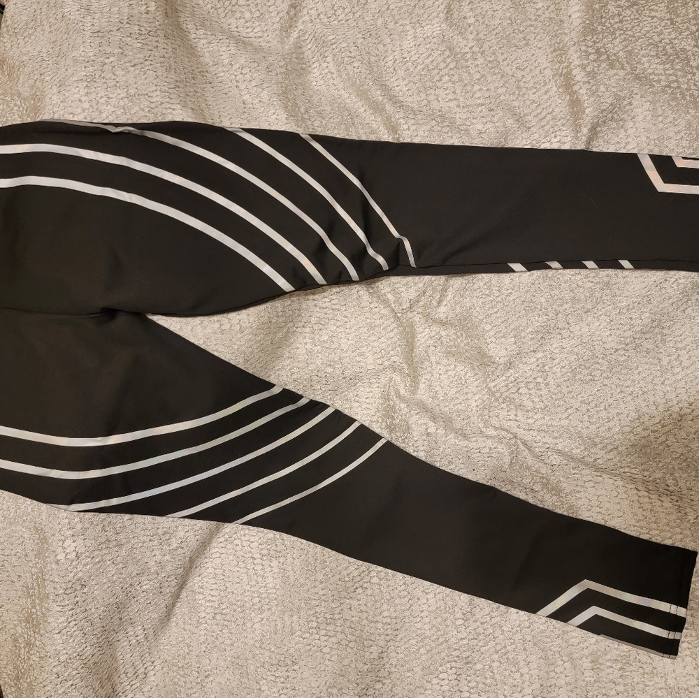 Womens S/M black leggings iridescent stripes